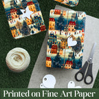 Two packages of decorative paper with a winter village design, a ball of yarn, and scissors on a textured surface.