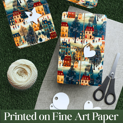 Two packages of decorative paper with a winter village design, a ball of yarn, and scissors on a textured surface.