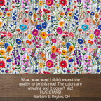 Colorful floral pattern with a wooden border and customer review text.