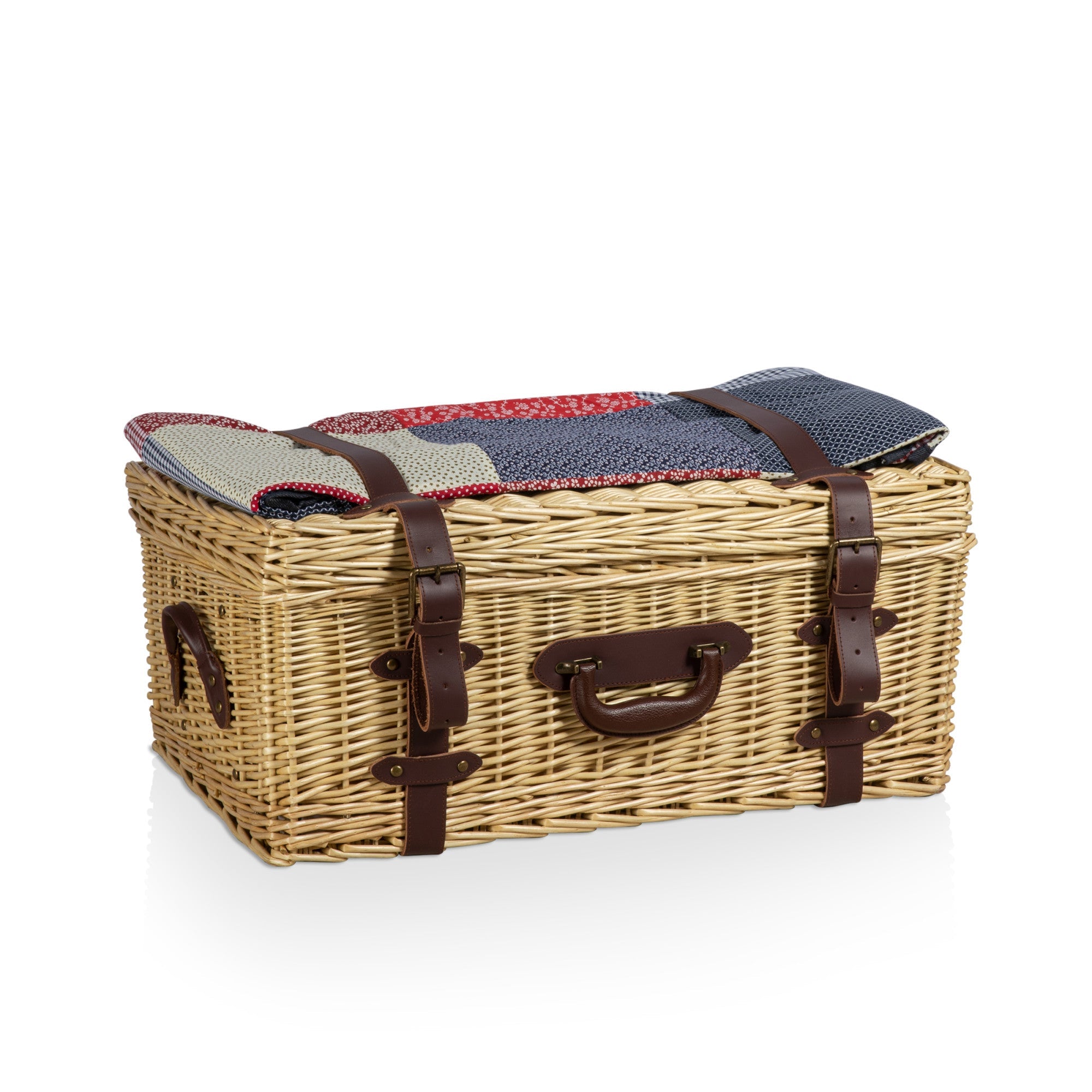 Wicker picnic basket with a patterned cover on a white background